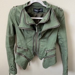 Green denim jacket with stud detail